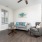 Styled living room with gray furniture and wood floors