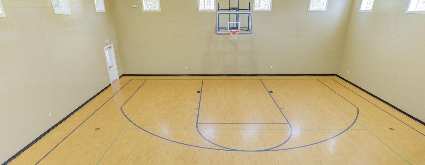 a basketball court with a basketball hoop