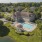Apartment building exterior aerial photo with pool