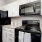 a kitchen with white cabinets